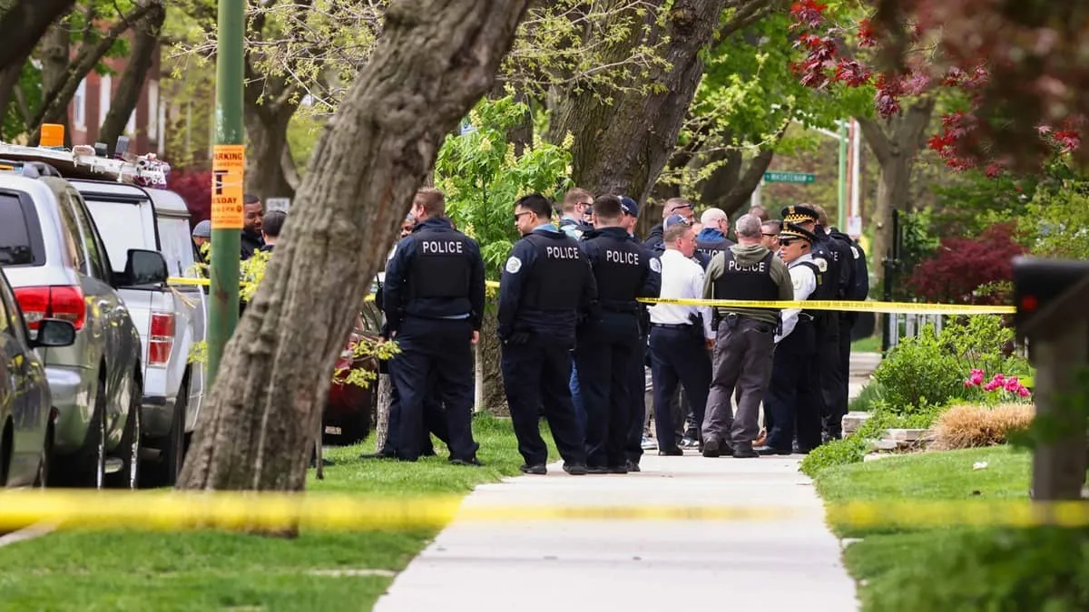 Chicago Hospital Shooting Officer Killed Suspect Fired While in Custody Another Critical