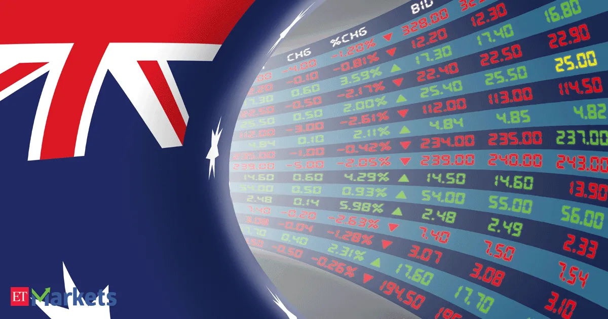 Australian shares slump to four week low as Woolworths plunges on earnings warning