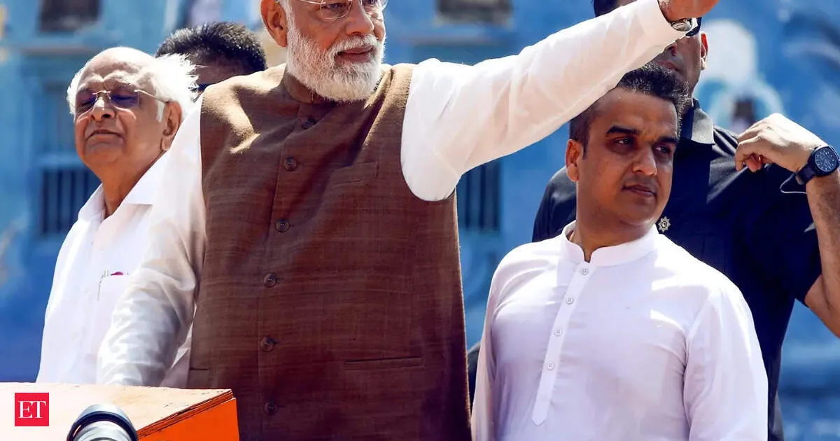 Modi tells cabinet to curb fuel and trips to shrink import bill without cutting welfare