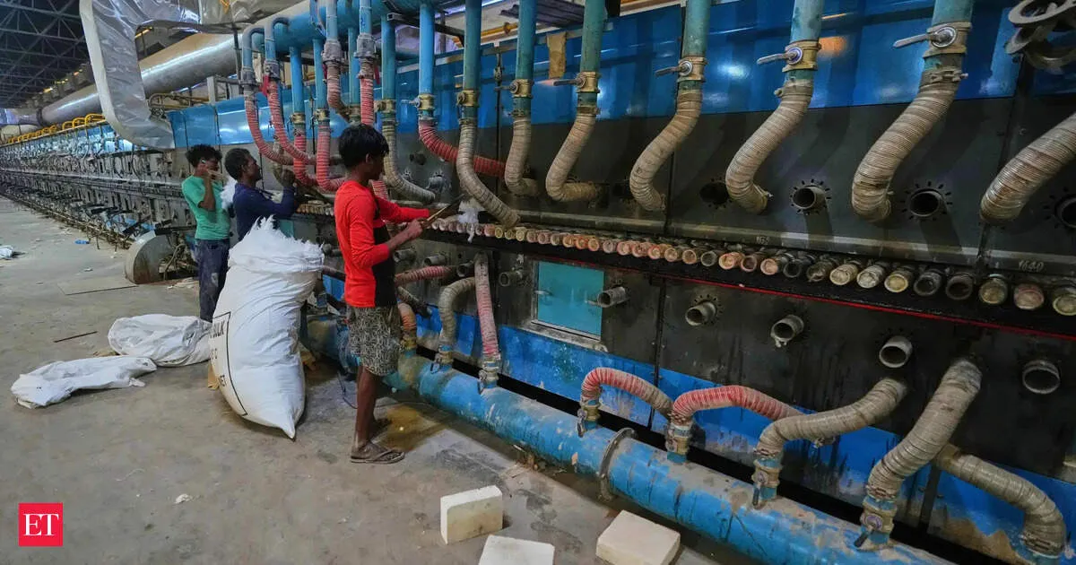 India factory growth nudges up in April but stays near four year low