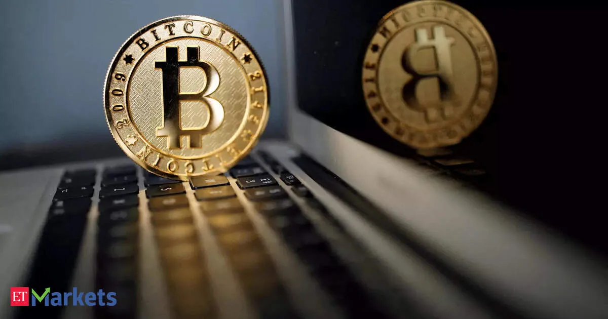 Bitcoin slips below 21 day average after Fed holds rates steady