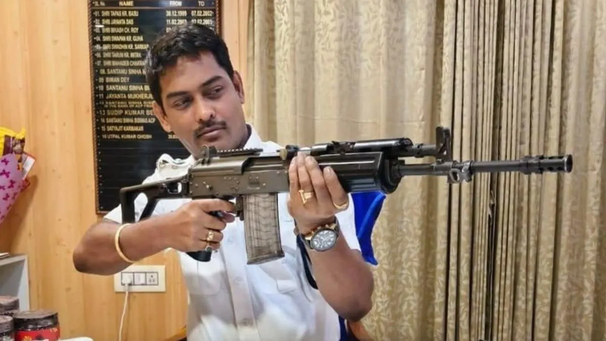 Kalighat Police OC Suspended After Viral Photo With Rifle Sparks Political Firestorm