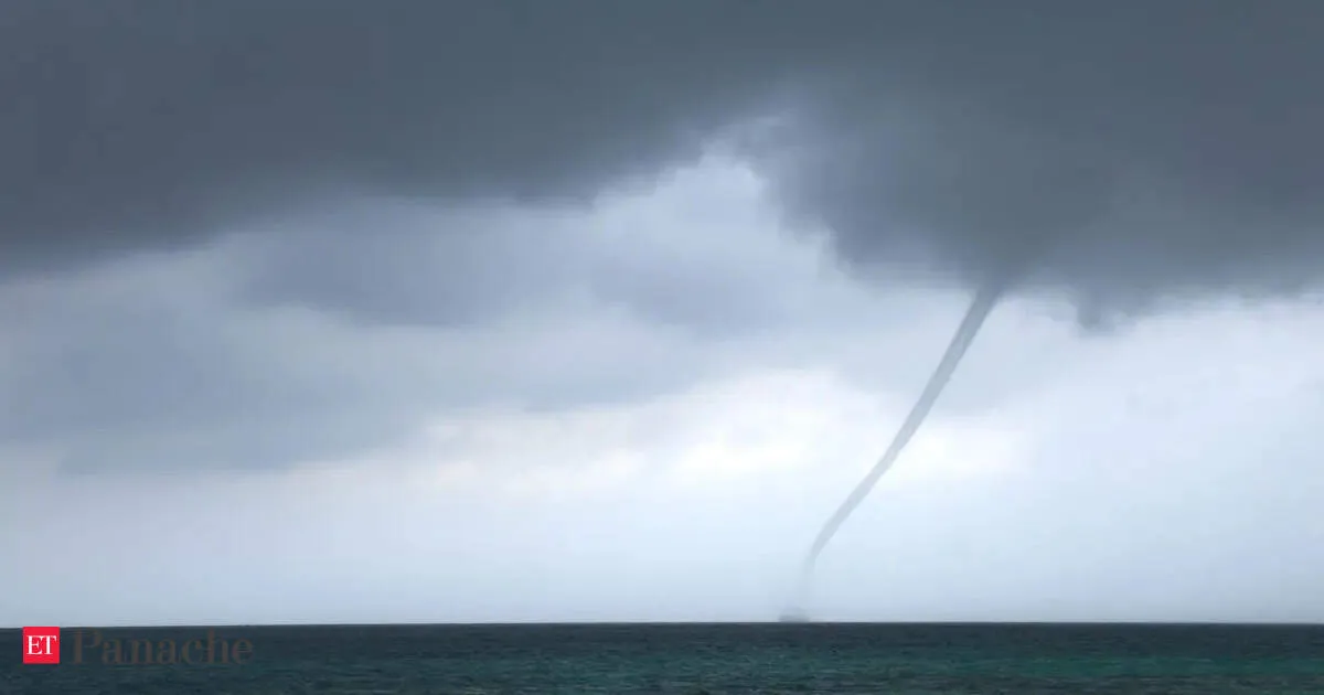 Rare waterspout forms off Odisha coast leaving tourists stunned as funnel hits the sea