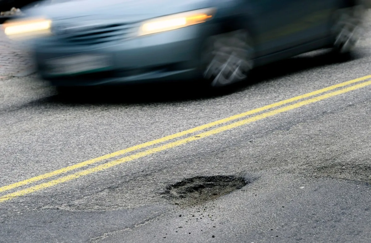 AI turns connected cars into pothole detectors that track damage in real time