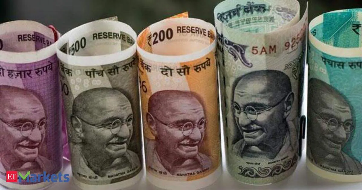 Rupee inches up near 93 as import demand and oil hedges keep pressure on