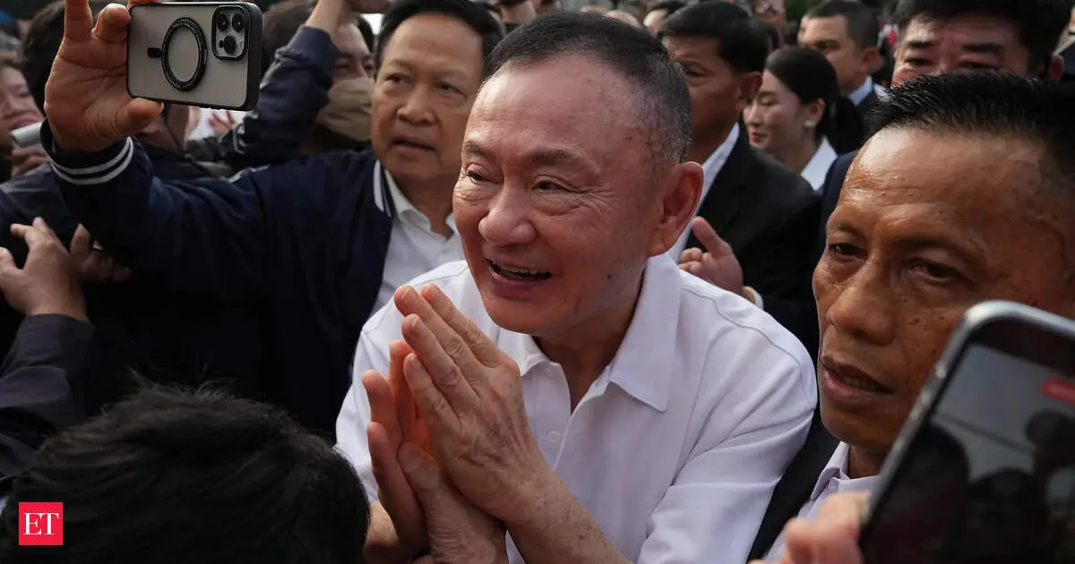 Thaksin freed early from Thai prison as probation begins with an electronic monitor