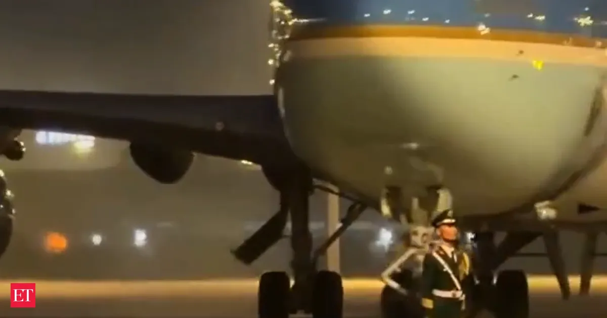 Chinese officer stands eerily still as Air Force One taxis yards away sparking fears and discipline claims